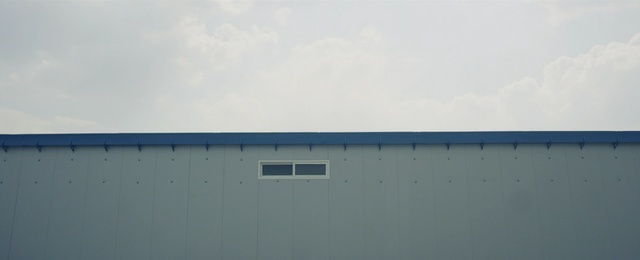 Video Reference: sky, cloud, architecture, daytime, roof, structure, line, shed, building, facade
