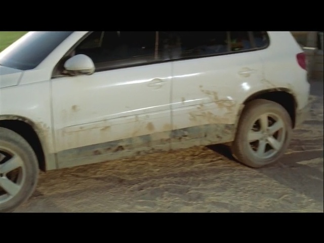 Video Reference: car, land vehicle, vehicle, motor vehicle, family car, rim, mode of transport, alloy wheel, automotive tire, vehicle door