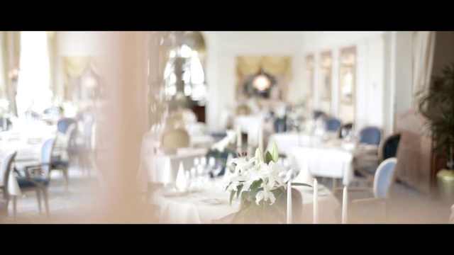Video Reference: White, Photograph, Room, Interior design, Furniture, Table, Floor, Living room, Restaurant, Dining room