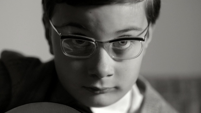 Video Reference: Eyewear, Face, Glasses, White, Black, Eyebrow, Black-and-white, Head, Nose, Forehead, Person