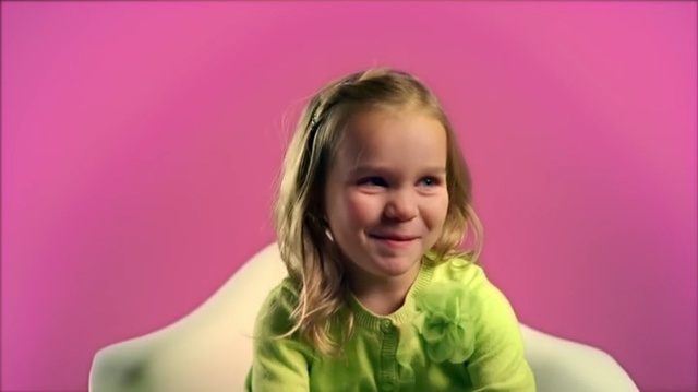 Video Reference: Hair, Face, Cheek, Facial expression, Child, Skin, Nose, Smile, Pink, Blond, Person