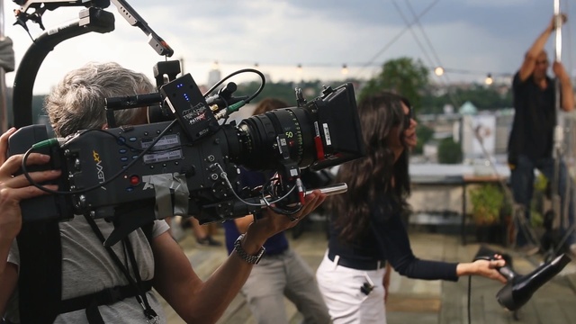 Video Reference: television crew, filmmaking, camera operator, cinematographer, film crew, recreation, tree, photographer