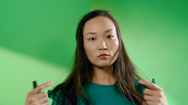 Video Reference: green, beauty, girl, cheek, black hair, long hair, brown hair, portrait, fun, portrait photography, Person