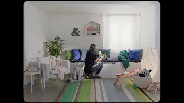 Video Reference: blue, white, green, photograph, room, home, furniture, house, snapshot, sitting, Person