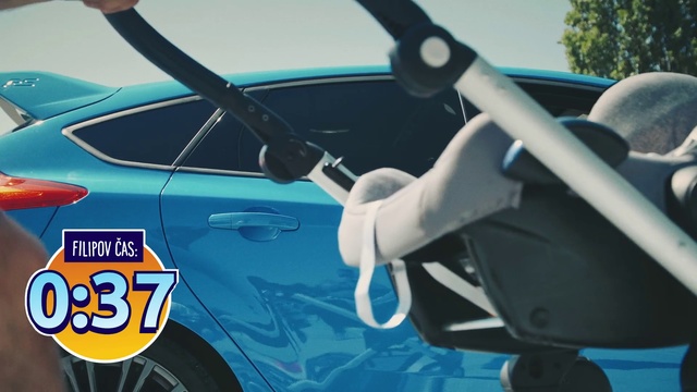 Video Reference: Motor vehicle, Vehicle door, Vehicle, Car, Automotive exterior, Mid-size car, Automotive design, Auto part, Windshield, Technology, Sitting, Small, Plane, Blue, Motorcycle, Parked, Street, Woman, Standing, Player, Man, Land vehicle