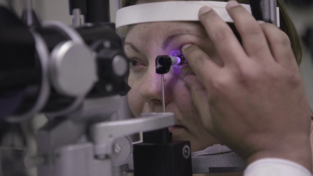 Video Reference: Optometry, Eye, Microscope, Organ, Glasses, Ophthalmology, Scientific instrument, Eyewear, Hand, Animation, Person