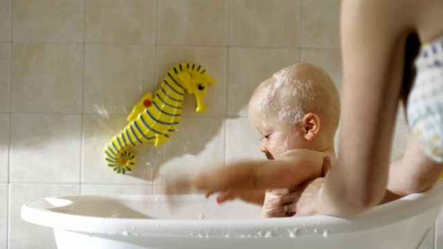 Video Reference: Bathing, Bathtub, Baby bathing, Child, Washing, Caterpillar, Person