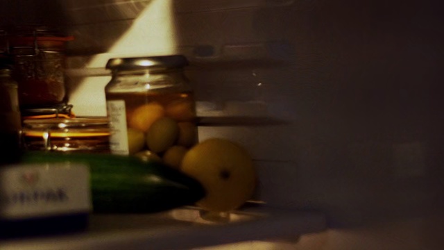 Video Reference: Still life photography, Photography, Room, Still life, Bottle, Glass bottle, Mason jar, Person, Indoor, Sitting, Computer, Table, Kitchen, Desk, Counter, Laptop, Food, Keyboard, White, Microwave, Mouse, Holding, Plate, Oven, Man, Standing, Fruit, Light, Apple, Cluttered