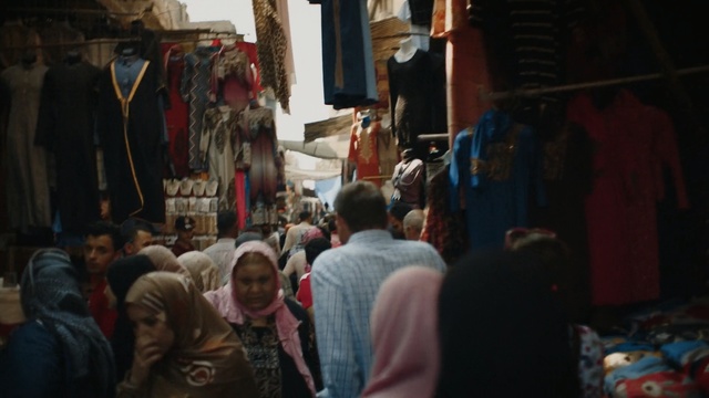 Video Reference: Bazaar, Market, People, Public space, Human settlement, Marketplace, City, Street, Town, Crowd, Person