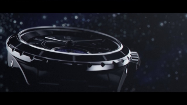 Video Reference: Watch, Font, Photography, Still life photography, Space, Technology, Macro photography, Darkness, Fashion accessory, Object, Thing, Sitting, Indoor, Computer, Table, Laptop, Black, Front, Monitor, Screen, Desk, Small, Keyboard, Dark, Glass, Close, Silver, Clock, Mouse, Red, White, Clear, Laying, Cat