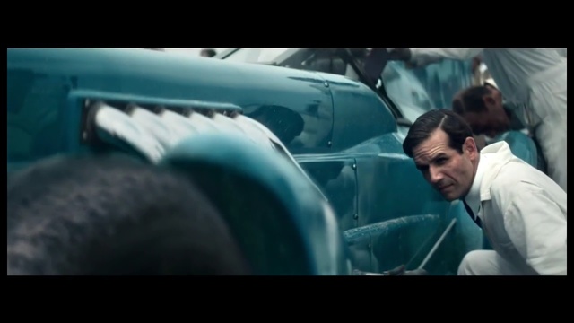 Video Reference: blue, face, mammal, mode of transport, windshield, snapshot, film, glass, automotive window part, window