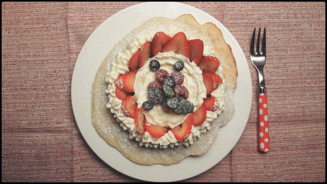 Video Reference: dessert, food, dish, cuisine, breakfast, pavlova, recipe, Person