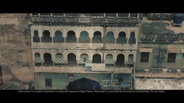 Video Reference: Landmark, Historic site, Arch, Architecture, Holy places, Ancient rome, Building, History, Arcade, Facade, Person, Front, Man, Large, Standing, Riding, Street, Table, White, Field, Driving, Group, City, People, Train, Text, Bridge