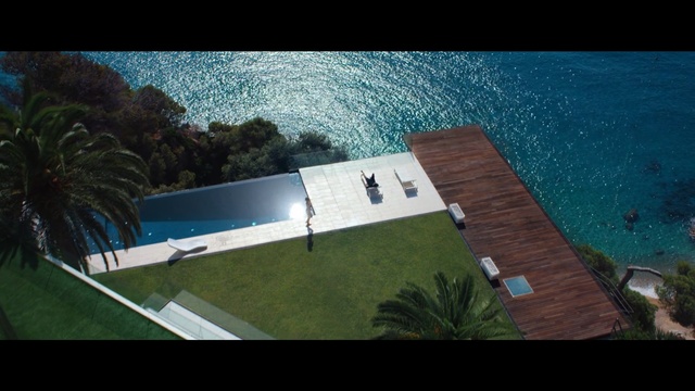 Video Reference: water, property, swimming pool, architecture, sky, house, leisure, real estate, tree, estate