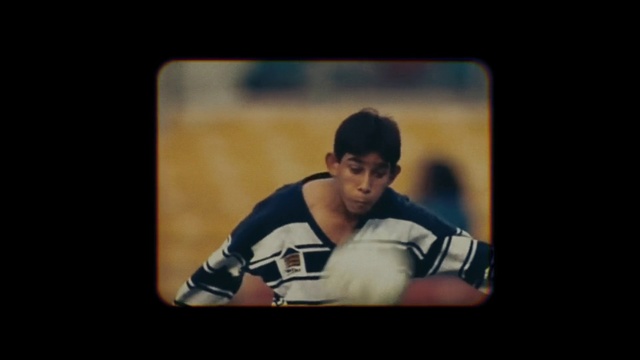 Video Reference: Photograph, Football player, Facial expression, Nose, Photography, Sitting, Player, Sports gear, Photo caption