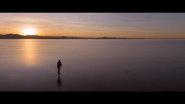 Video Reference: Body of water, Sky, Horizon, Water, Nature, Reflection, Calm, Evening, Sunrise, Dusk, Person