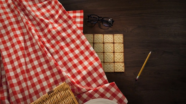 Video Reference: red, plaid, textile, pattern, design, tartan, product, material, flooring, floor, Person