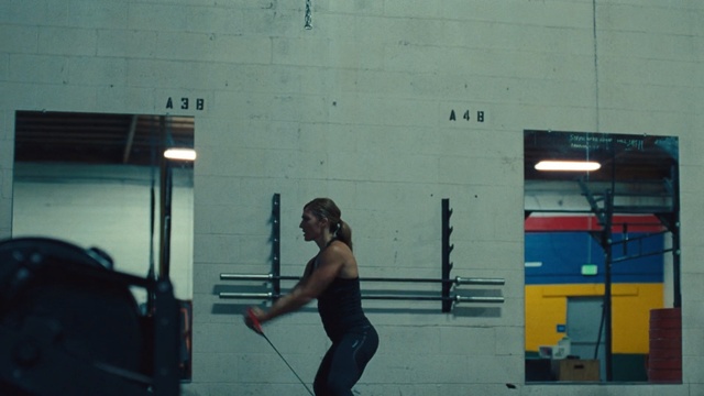 Video Reference: blue, standing, physical fitness, structure, snapshot, fun, girl, recreation, crossfit, physical exercise, Person
