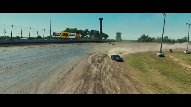 Video Reference: car, road, mode of transport, vehicle, asphalt, soil, grass, sand, sky, race track