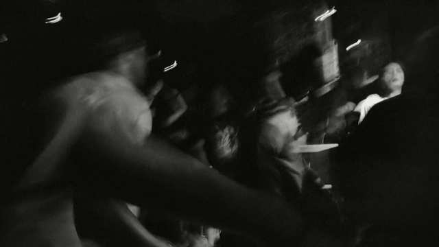 Video Reference: black, photograph, black and white, darkness, night, photography, monochrome photography, event, light, snapshot, Person