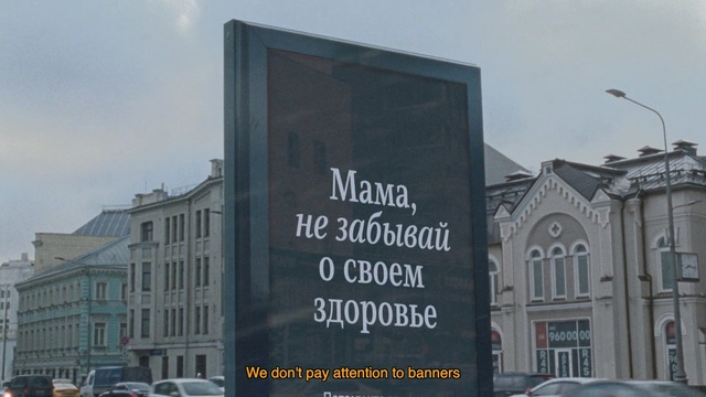 Video Reference: Landmark, Advertising, Building, Metropolitan area, Architecture, Facade, Neighbourhood, Banner, City, Font