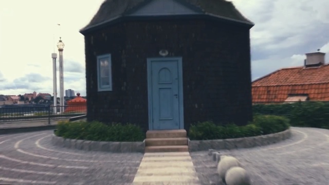 Video Reference: wall, building, facade, chapel, walkway, house, roof, asphalt