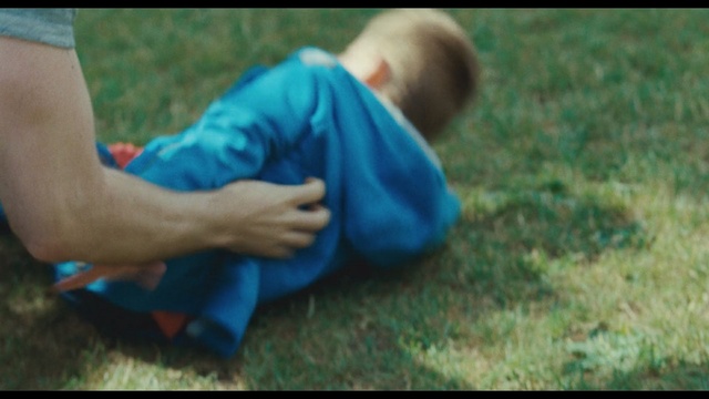 Video Reference: blue, green, photograph, nature, man, child, grass, mammal, vertebrate, sitting