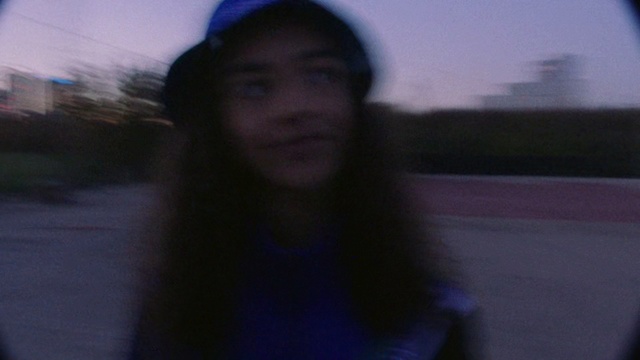Video Reference: Face, Blue, Photograph, Black, White, Facial expression, Purple, Light, Cool, Head