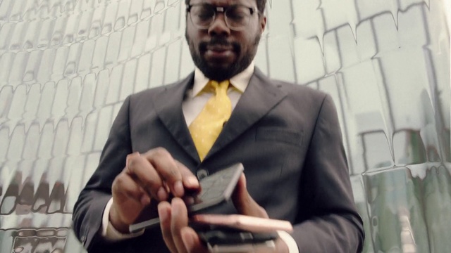 Video Reference: Suit, Businessperson, White-collar worker, Gesture, Tie, Formal wear