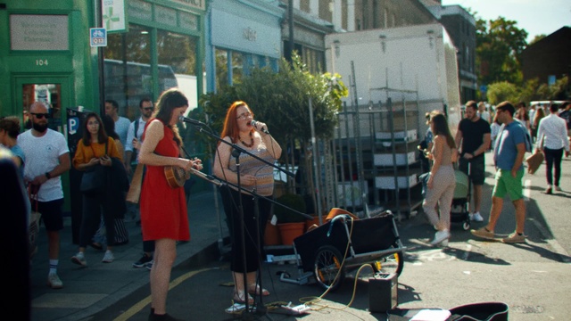 Video Reference: Street performance, Street, Musician, Event, Street artist, Pedestrian, Vehicle, Crowd, Musical instrument, City