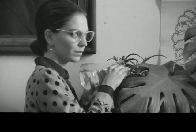 Video Reference: eyewear, face, white, black, photograph, black and white, monochrome photography, nose, vision care, lady, Person