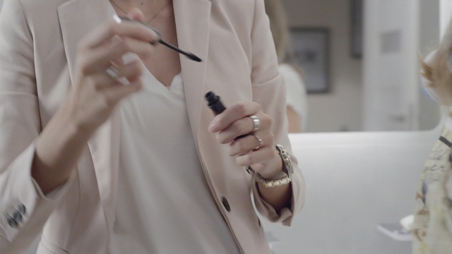 Video Reference: White, Hand, Outerwear, Eyewear, Finger, Coat, Fashion accessory, Trench coat, Street fashion, Glasses