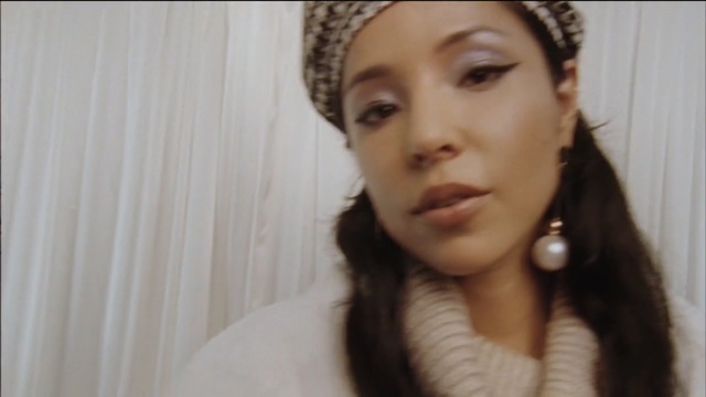 Video Reference: hair, hair accessory, eyebrow, fashion accessory, hairstyle, headgear, cheek, girl, forehead, black hair, Person