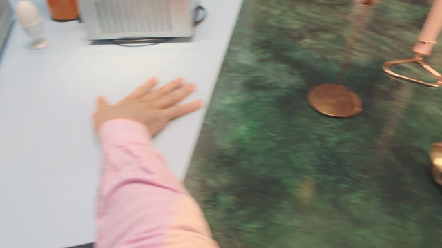Video Reference: green, floor, hand, flooring, finger, wood, material, table, play, wood stain