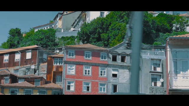 Video Reference: residential area, neighbourhood, town, urban area, property, house, building, home, architecture, sky, Person