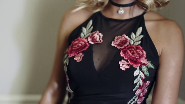 Video Reference: Clothing, Pink, Shoulder, Dress, Neck, Flower, Joint, Outerwear, Plant, Pattern
