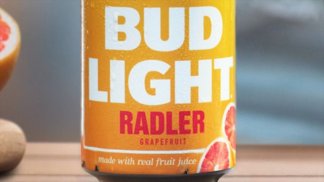 Video Reference: Drink, Tin can, Orange soft drink, Soft drink, Beverage can, Carbonated soft drinks, Person