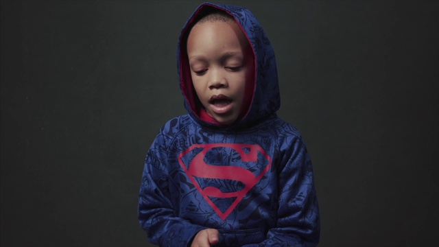 Video Reference: Blue, Head, Outerwear, Mouth, Hoodie, Photography, T-shirt, Fictional character, Hood, Smile