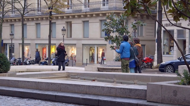 Video Reference: Pedestrian, Street, Sidewalk, Building, Car, Vehicle, Road, City, Urban design