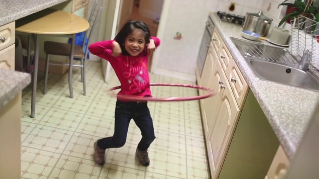 Video Reference: Hula hoop, Leg, Fun, Room, Floor, Leisure, Toy, Flooring, Play, Person