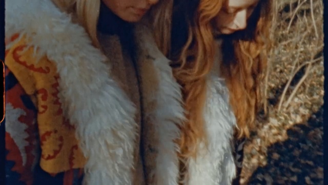Video Reference: fur clothing, fur, textile, long hair, mane, girl, formation, brown hair, Person