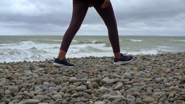 Video Reference: Pebble, Sea, Shore, Water, Beach, Leg, Human leg, Sand, Gravel, Rock
