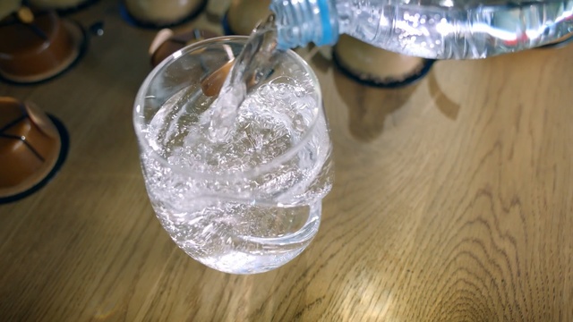 Video Reference: Water, Glass, Transparent material, Drinkware, Ice cube, Drink, Tableware, Person
