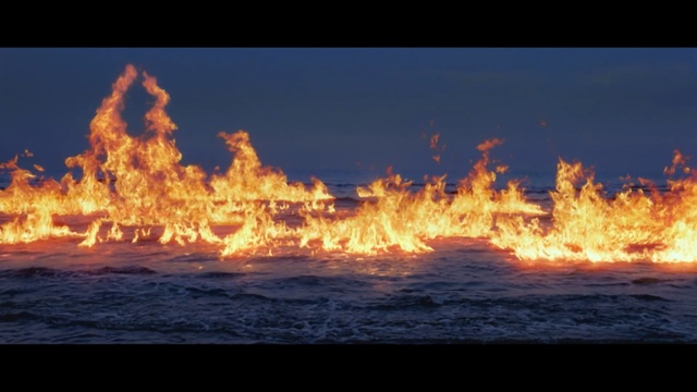 Video Reference: sky, geological phenomenon, heat, flame, atmosphere, horizon, sea, fire, campfire, dawn