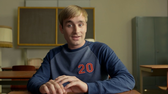Video Reference: Arm, Finger, Hand, Room, Gesture, T-shirt, Smile, Student, Thumb, Person