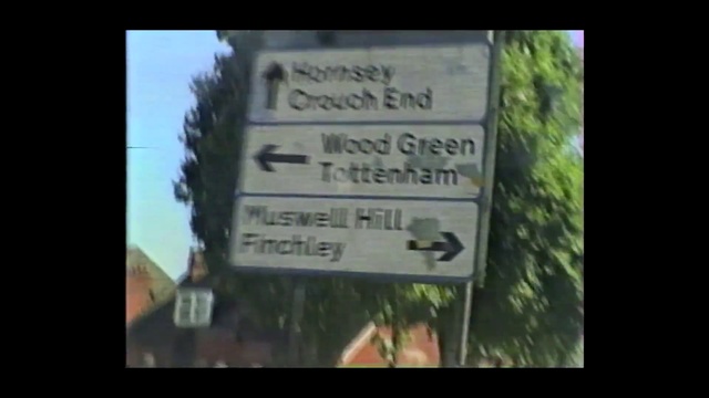 Video Reference: Nature, Tree, Text, Font, Sign, Signage, Leaf, Grass, Woody plant, Traffic sign