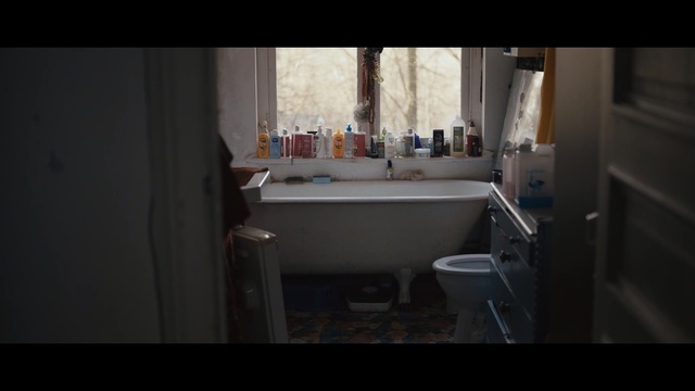 Video Reference: room, property, bathroom, home, house, darkness, window, screenshot, interior design, floor