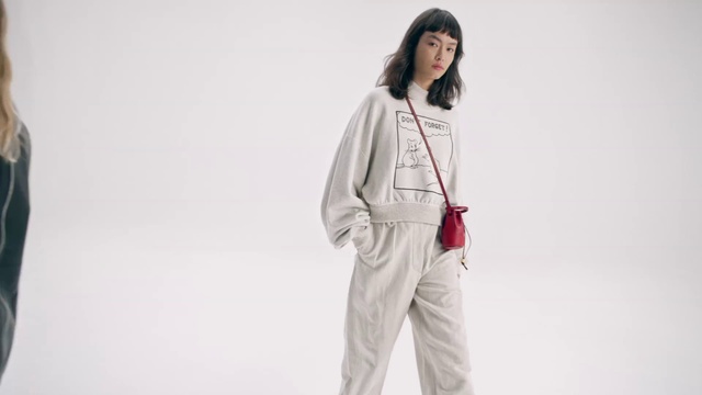 Video Reference: Face, Dress shirt, Sleeve, Gesture, Waist, Collar, Street fashion, Workwear, Blazer, Fashion design