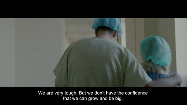 Video Reference: Joint, Human, Photo caption, Headgear, Surgeon, Room, Cap, Photography, Jaw, Hospital