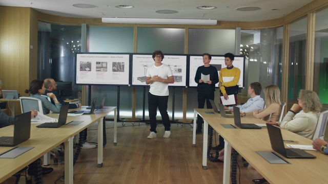 Video Reference: Room, Event, Classroom, Seminar, Table, Meeting, Building, Training, Conference hall, Office